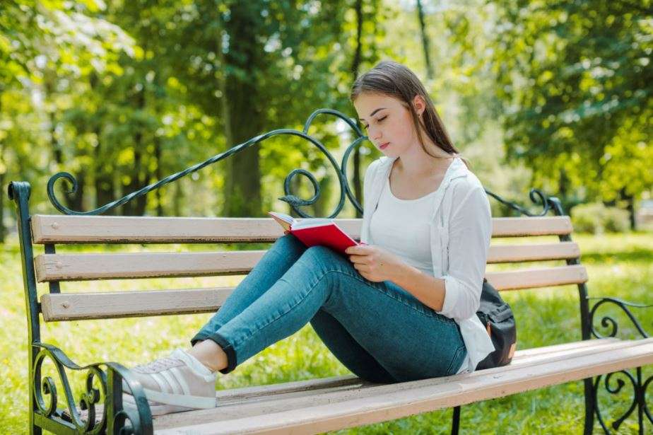 Young girl reading a book 12