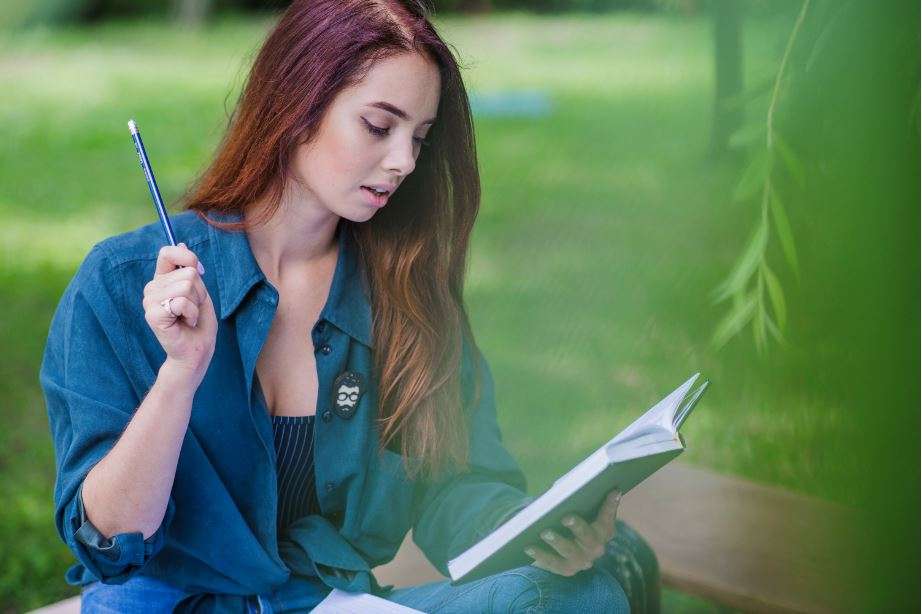Young girl reading a book 13